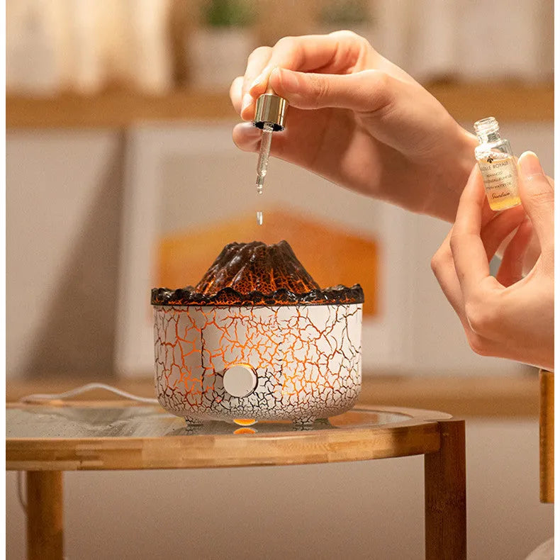 Column-shaped volcano humidifier emitting mist with colourful LED lights and remote control