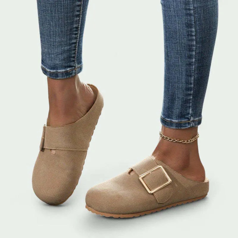 Women's brown closed toe canvas slippers with low top design showing size options