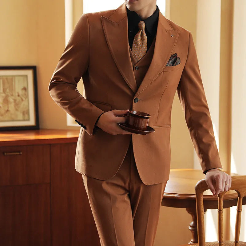 Men's slim fit three-piece corduroy linen blend suit set with coat, vest, and trousers in caramel