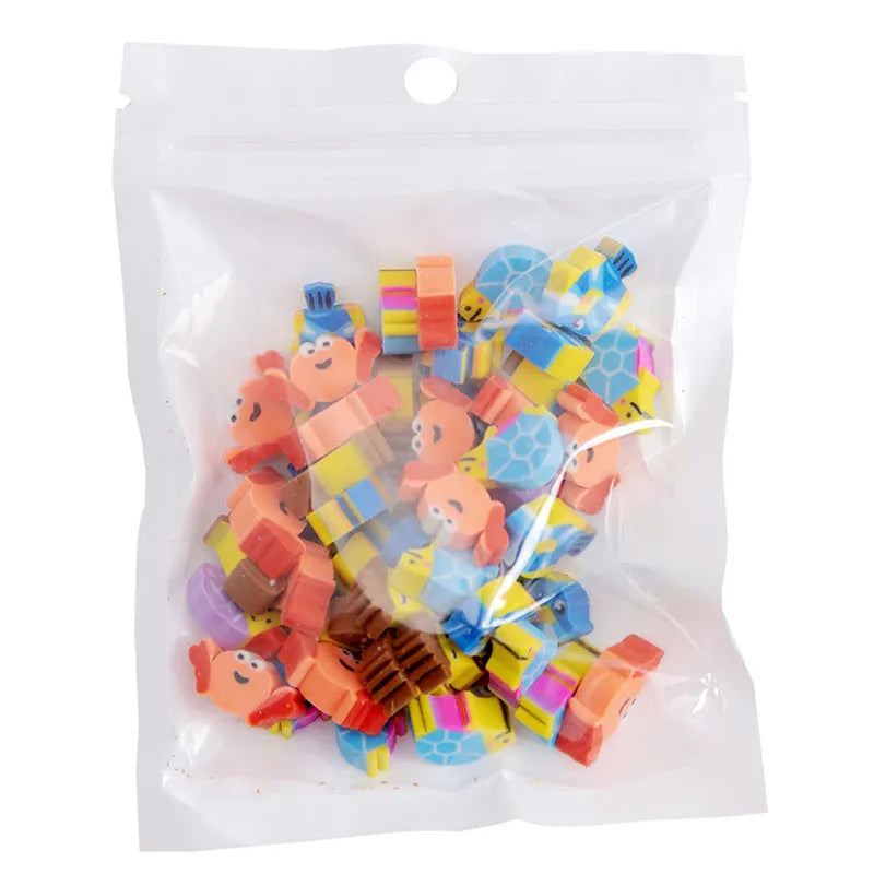 50 small colourful cartoon-themed TPR rubber erasers in a pearlescent film bag, themes include fruit, animal, and cake designs.