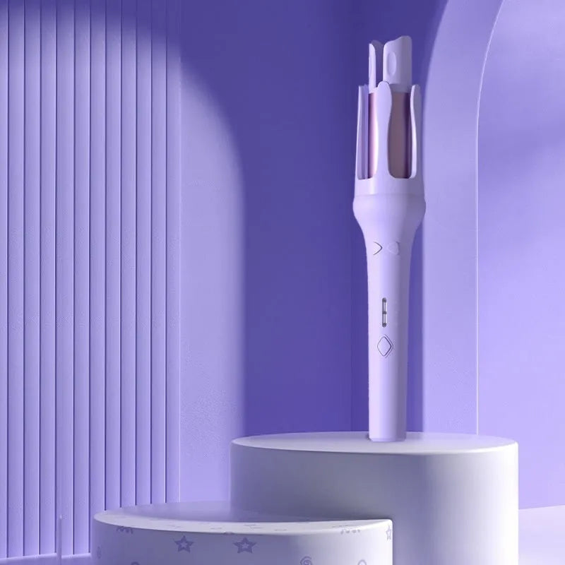 White and Chigo brand automatic hair curler with a 32mm barrel on a table.