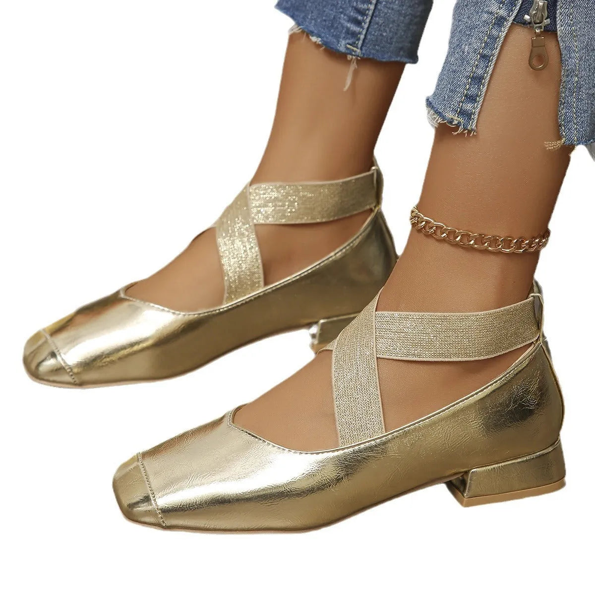Gold French evening style slip-on pumps with a skirted collar and square toe on a white background.