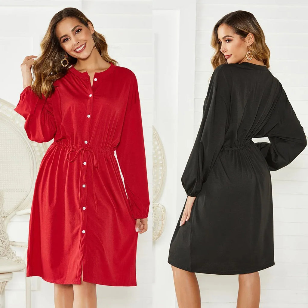 A black polyester cardigan dress with long sleeves, an elastic waist, and a removable cinch belt on a midi A-line skirt.