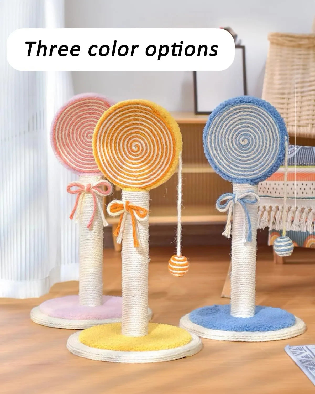 Blue cat scratching post with natural sisal rope and a dangling yellow ball on a sturdy wooden base