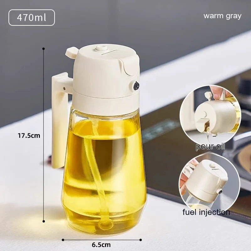 Glass olive oil sprayer bottle with ergonomic handle in beige, showing spray and pour functions.