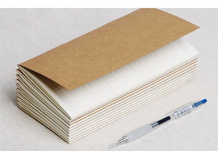 11x21cm cowhide diary refill notebook with saddle stitch binding and ivory white paper pages.