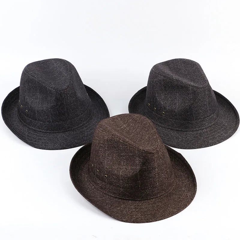 Men's classic fedora hat in suit material showing centre crease crown and flat brim.