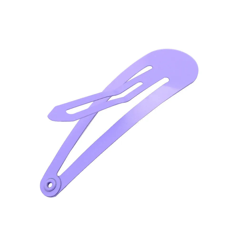 80 piece assortment of 2 inch metal hair clips in 20 different colours, displayed in a zip-lock bag.