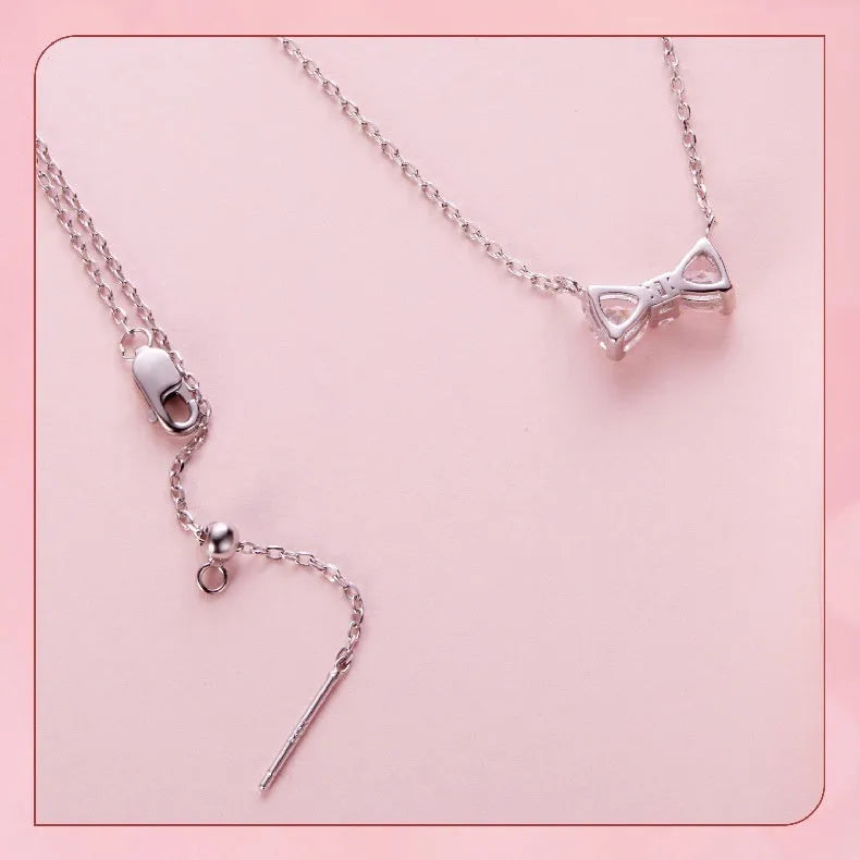 925 sterling silver bow pendant necklace on O-ring clavicle chain in colour BSN434, 41-50cm perimeter