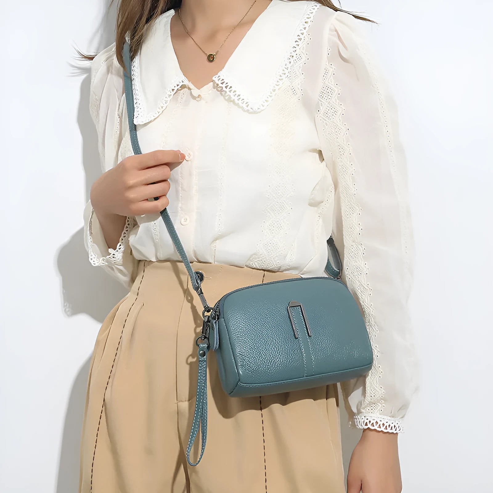 Genuine leather women's shoulder bag in a horizontal square shape, shown in dark khaki colour.