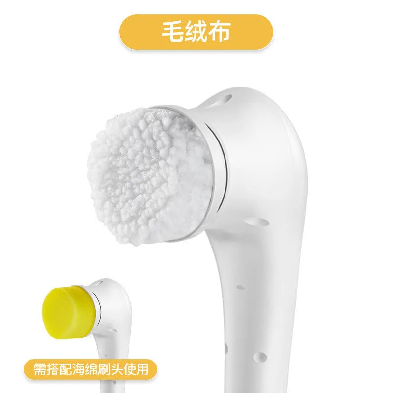 White cordless electric handheld cleaning brush with set of five different brush heads on a USB charging cable