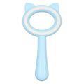 Blue and white double-sided pet grooming brush with ergonomic handle on a table