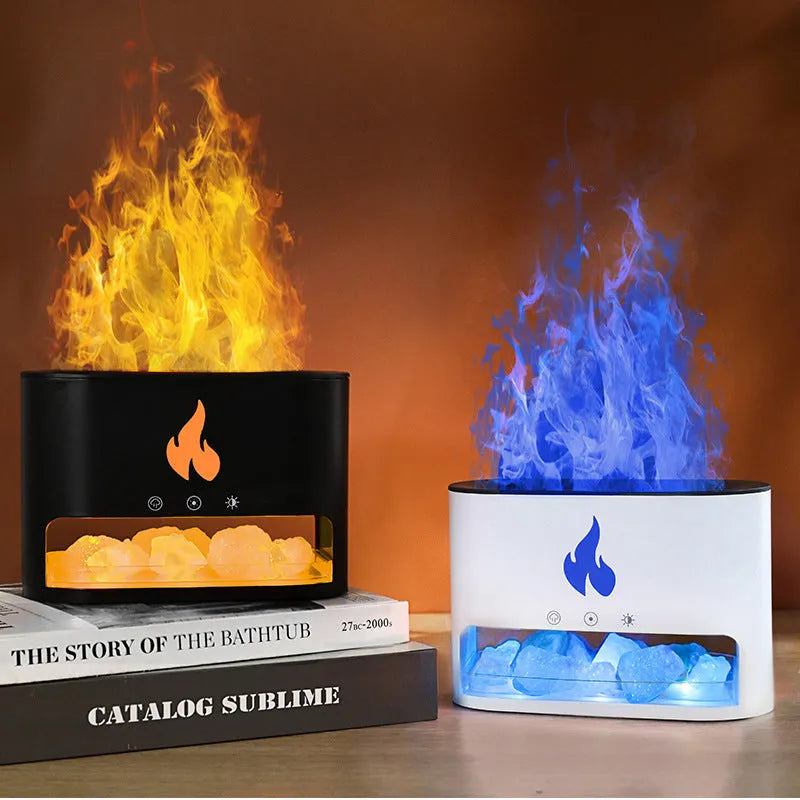 Square white ultrasonic humidifier and aromatherapy diffuser with colourful 3D flame light effect on a desk.
