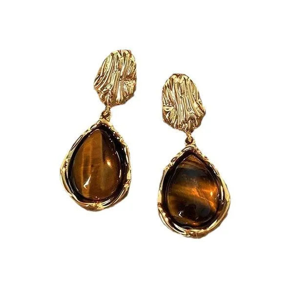 Handmade 3-pair women's holiday earring set showing geometric tassel designs in electroplated alloy