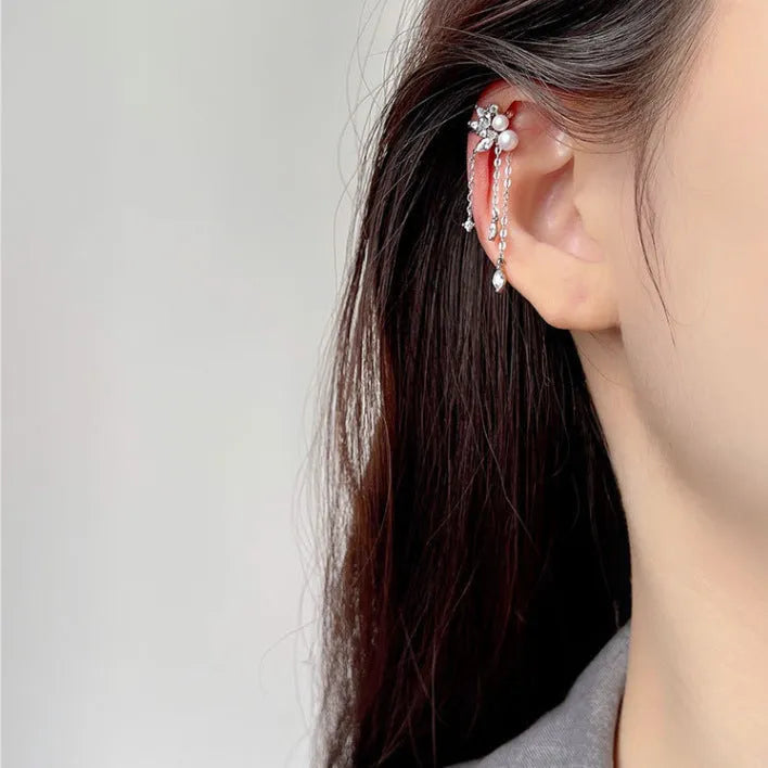 Pearl tassel ear clips in yellow gold or white gold colour with brass base and geometric shape