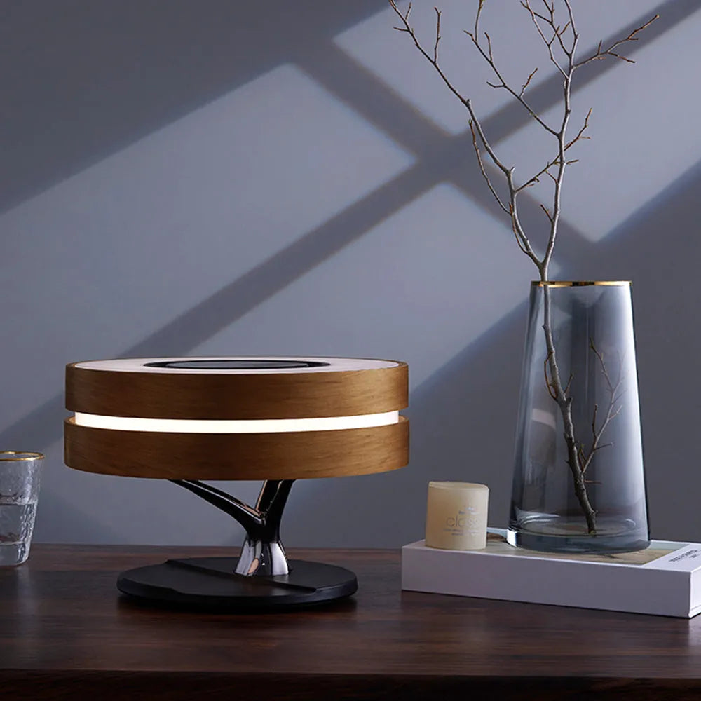 Round maple coloured ABS PC Bluetooth speaker LED lamp with wireless charging pad for living room