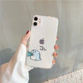 Clear transparent iPhone case with green dinosaur design showing phone protection