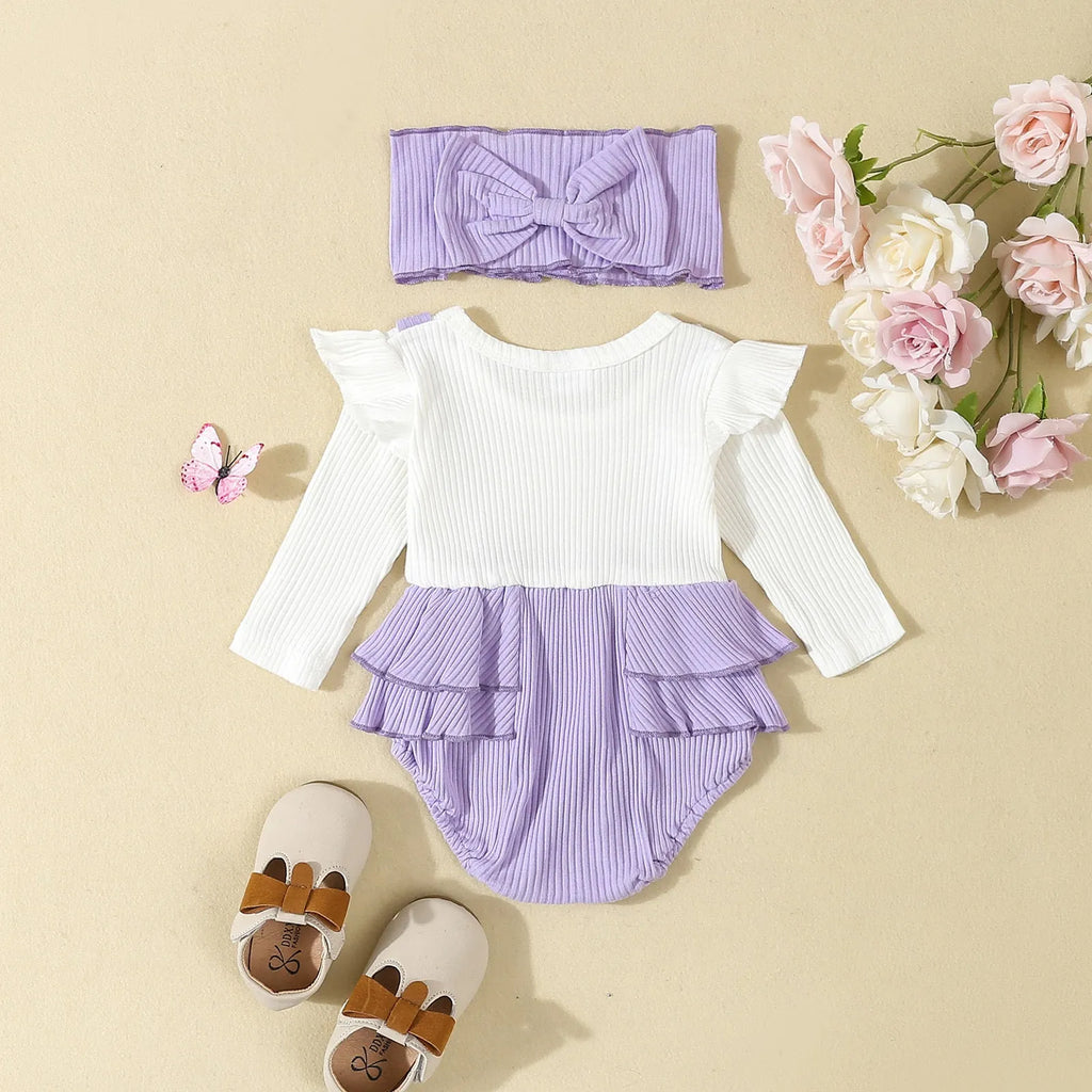 Baby girls cotton romper with flounced shoulder strap and long sleeves in pink, triangle jumpsuit style