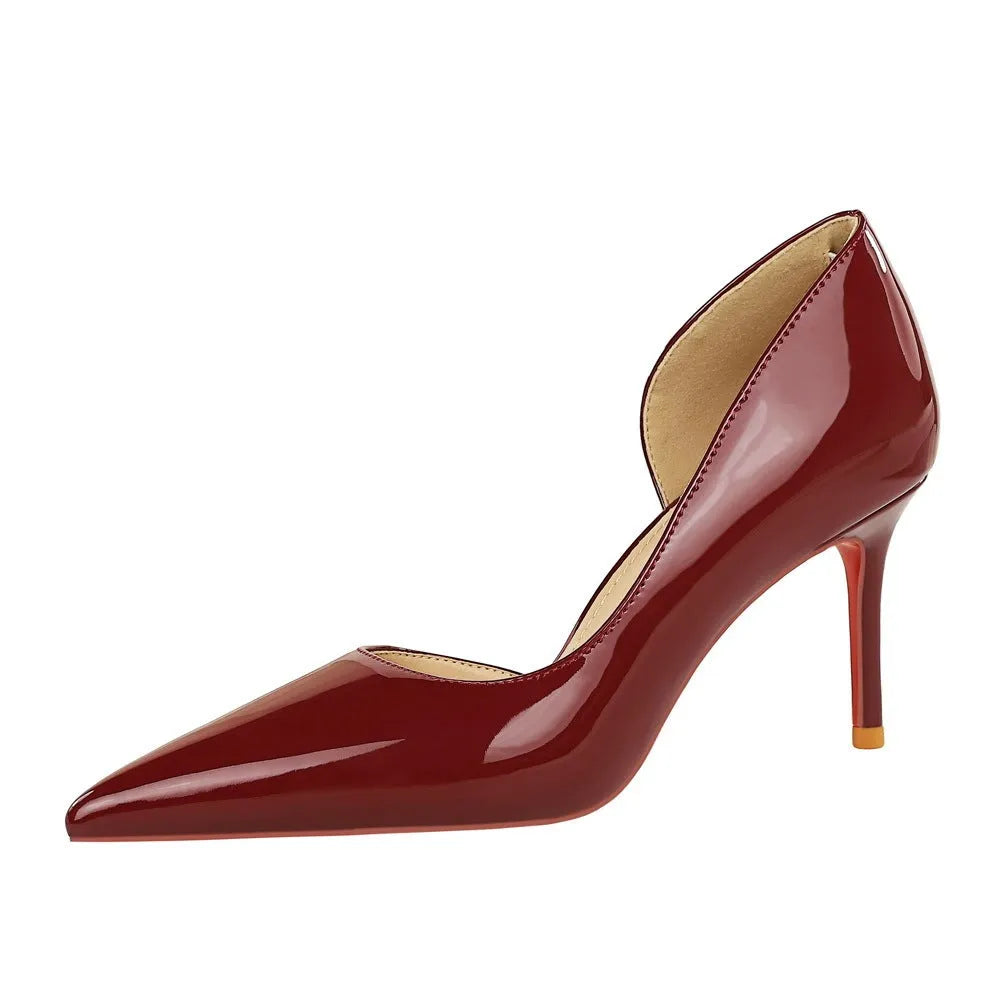 Women's patent leather stiletto pumps with hollow shallow mouth design in nude colour
