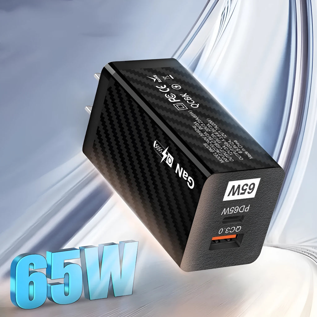 White and black 65W GaN USB-C laptop travel charger with UK, US, and EU plug options