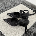 Women's special-shaped root lace-up high heels in black and pink, showing cowhide upper and lace detail.