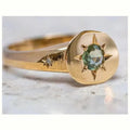 Gold-colour adjustable ring with a micro-inlaid oval star design on a zinc alloy band.