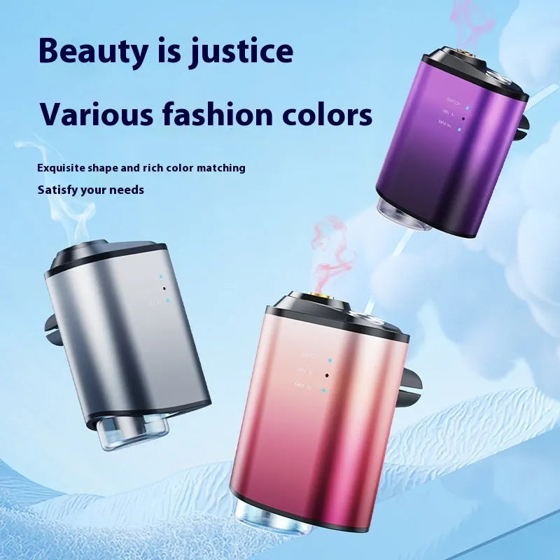 Black car aromatherapy smart fragrance diffuser with ocean scent bottle next to it