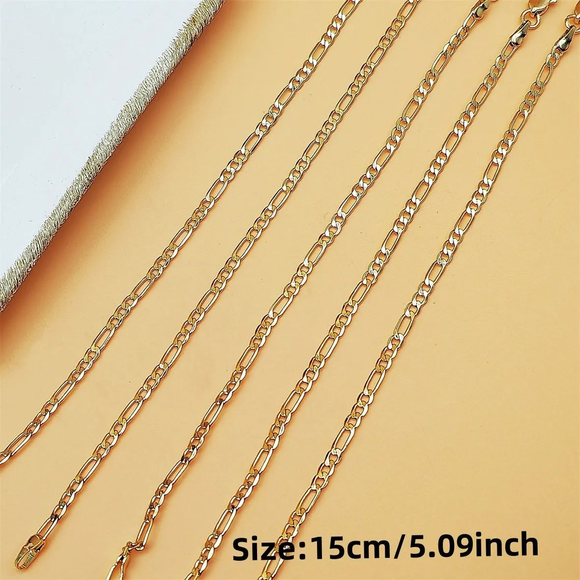 Gold coloured unisex NK chain bracelet with geometric links and 18K real gold plating on copper