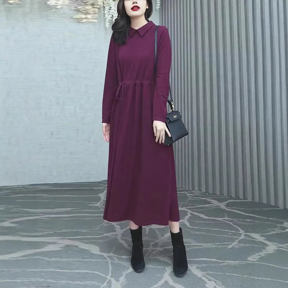 Purplish red plus size long sleeve dress with a long skirt for women.