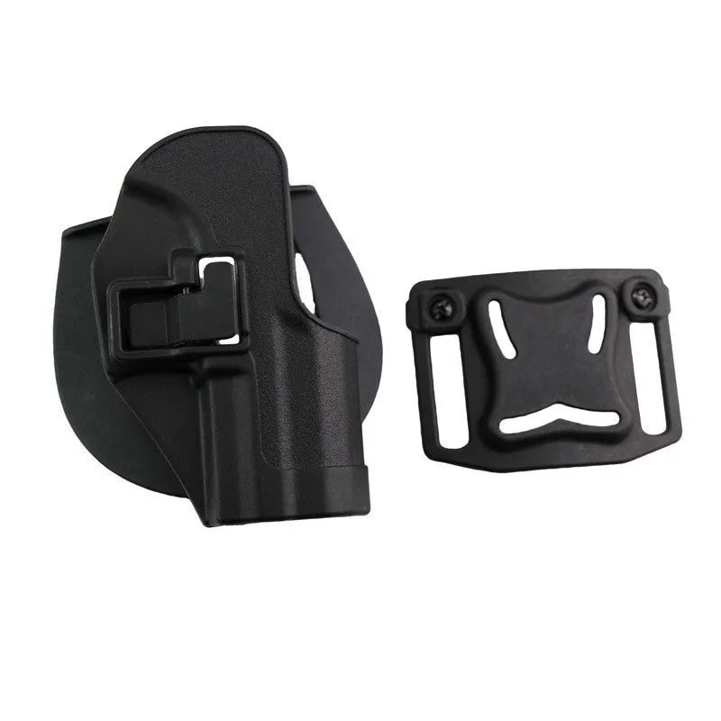 Black plastic tactical holster on plain background for duty carry use