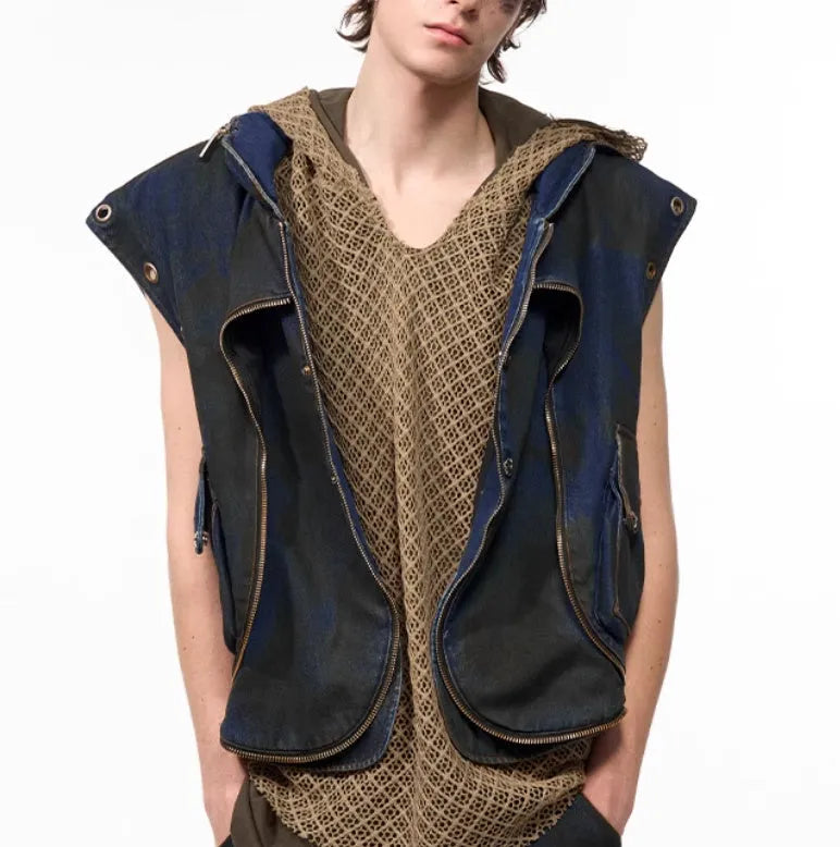 Blue hooded denim vest coat with matching trousers set on mannequin
