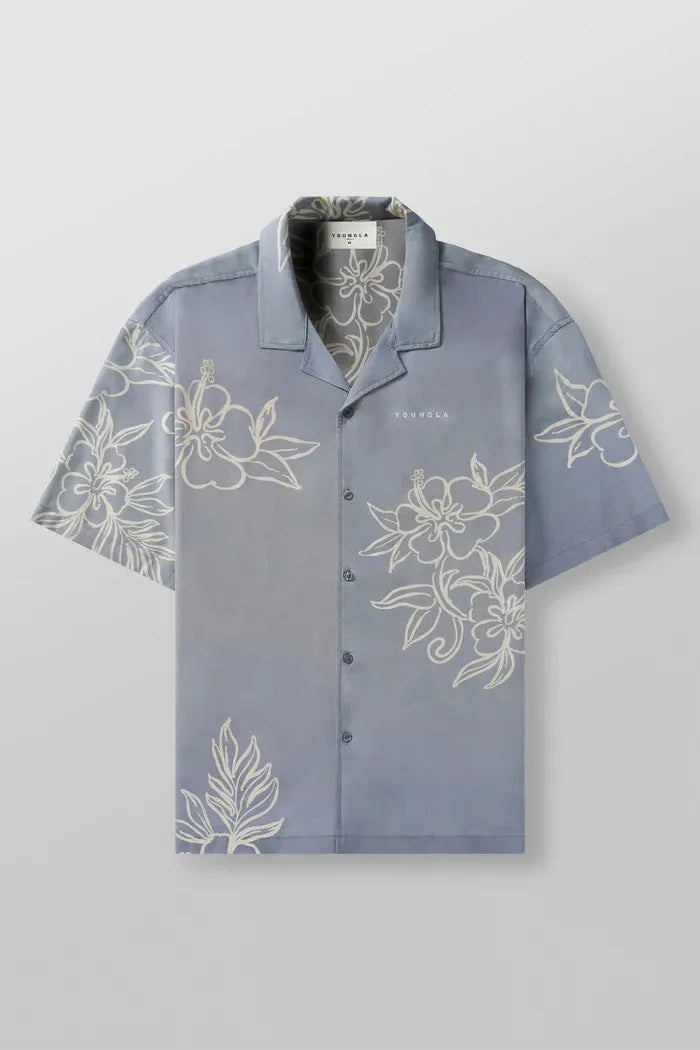 Man's loose-fitting short sleeve cardigan top with a floral print in light colours.