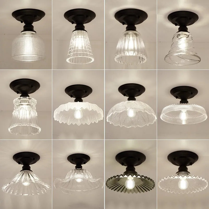 American retro style single-head ceiling or wall lamp with a glass cover.