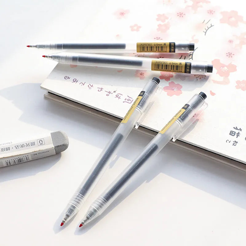 Set of twelve black frosted gel pens with retractable design and 0.5mm tips alongside two spare refills