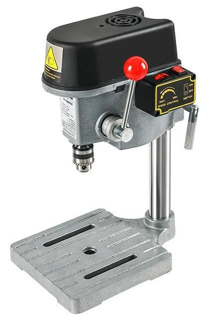 Mini bench drill and milling machine with 1050W drill and bench pliers on a workbench.