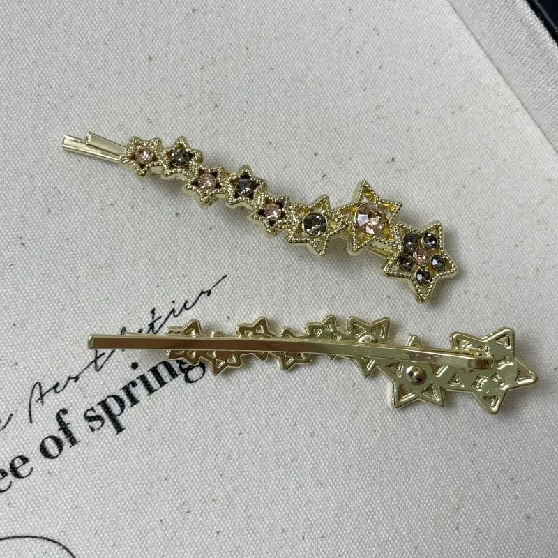Gold-coloured alloy hair barrette with rhinestone, star, and word decoration in Korean style.