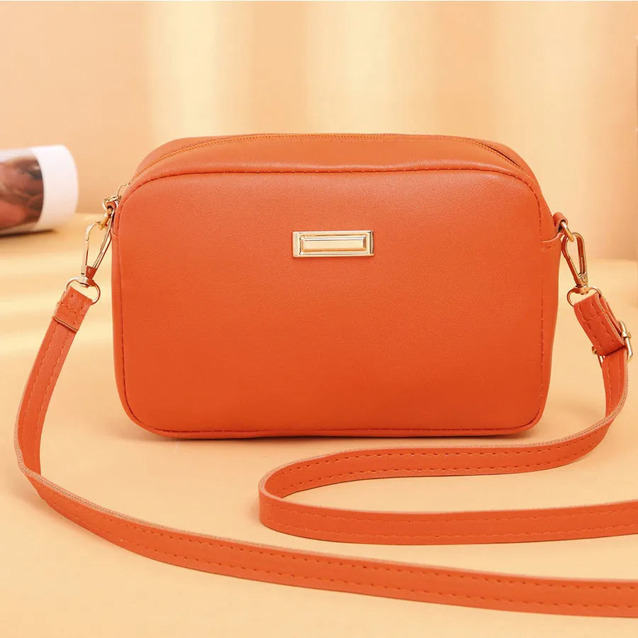 Solid colour PU ladies' shoulder bag in horizontal square shape with three-dimensional pocket.