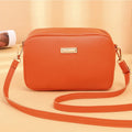 Solid colour PU ladies' shoulder bag in horizontal square shape with three-dimensional pocket.