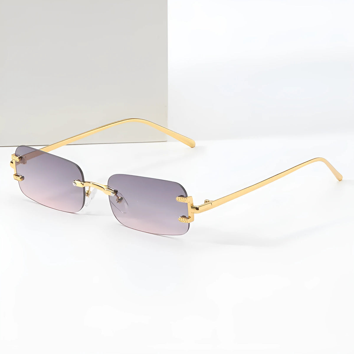 Retro square frameless sunglasses with metal frame and AC lenses, gold or black frame, six colour options.