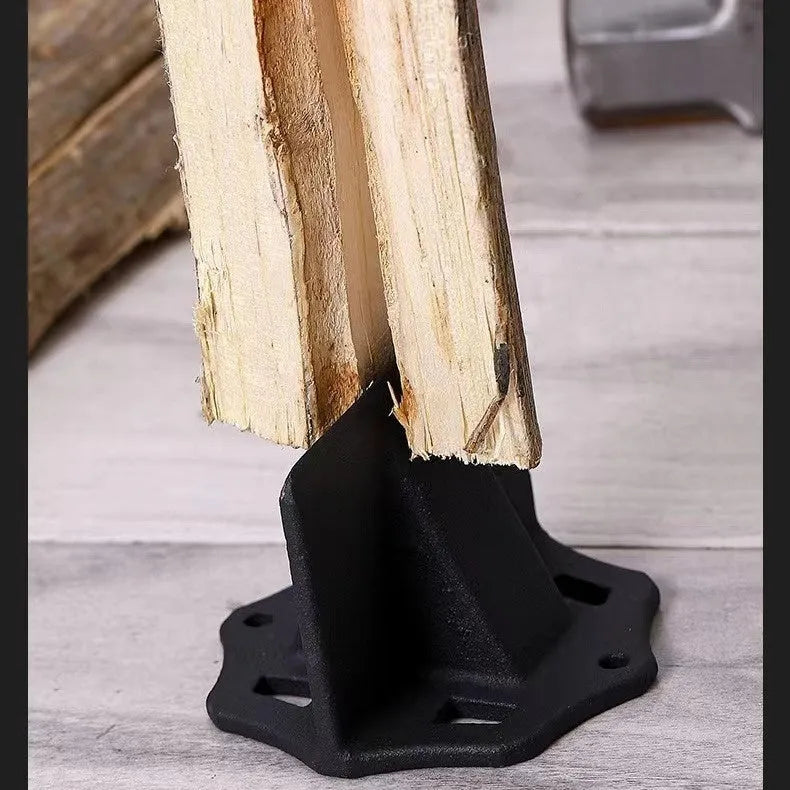 Small square cast iron wood splitter tool on a wooden background.