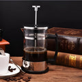 Compact stainless steel and glass pour-over coffee maker with 350ml carafe