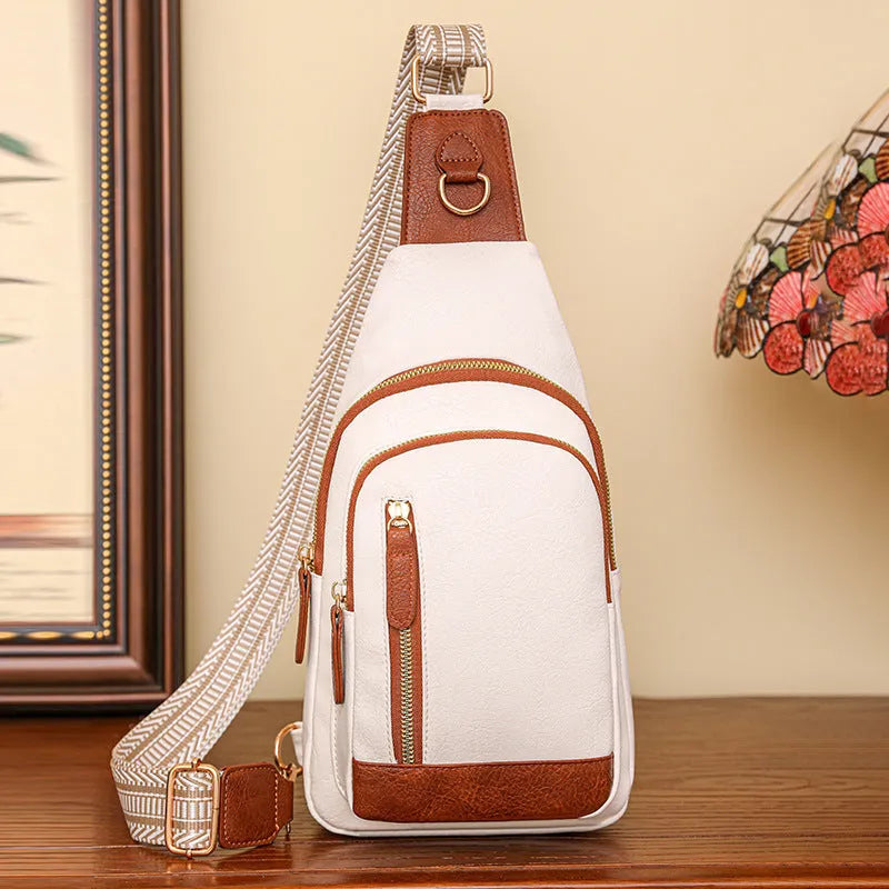 Soft brown PU leather women's crossbody messenger bag with an open front pocket.