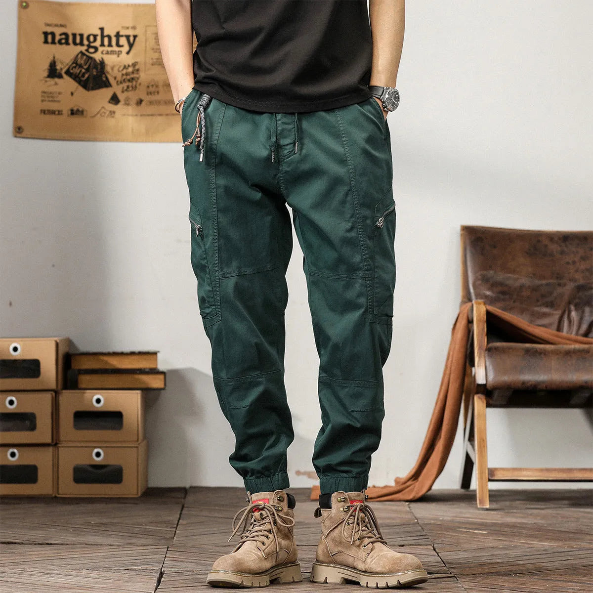 Men's khaki cotton harem pants with tapered leg and ankle band on a mannequin.