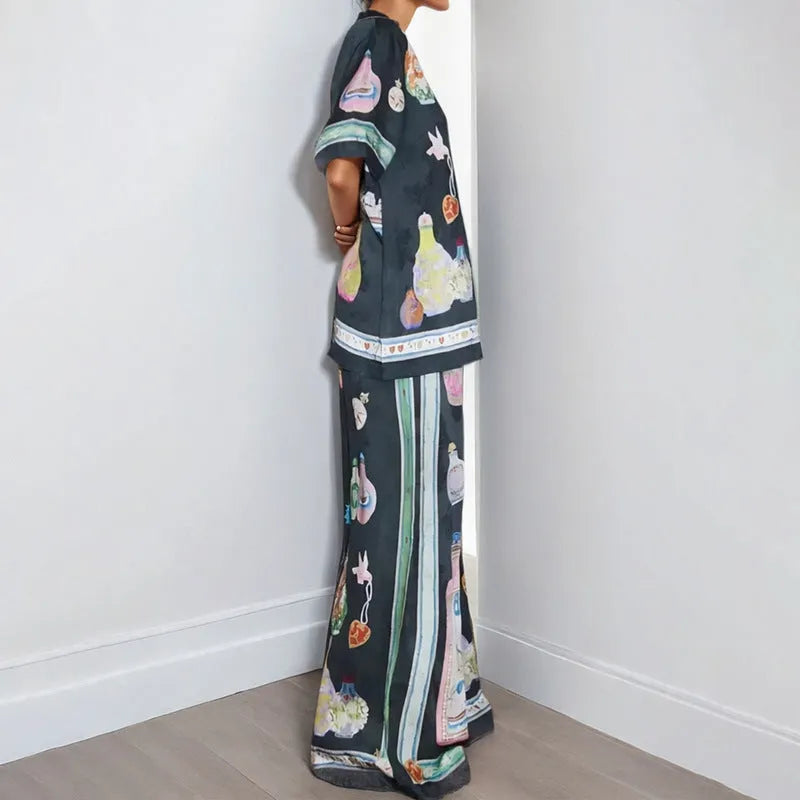 Black women's casual set with cartoon pattern cardigan and matching trousers
