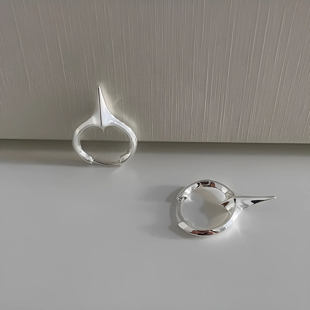 Geometric star shape ear clips with white gold electroplated finish, personality statement jewellery for women