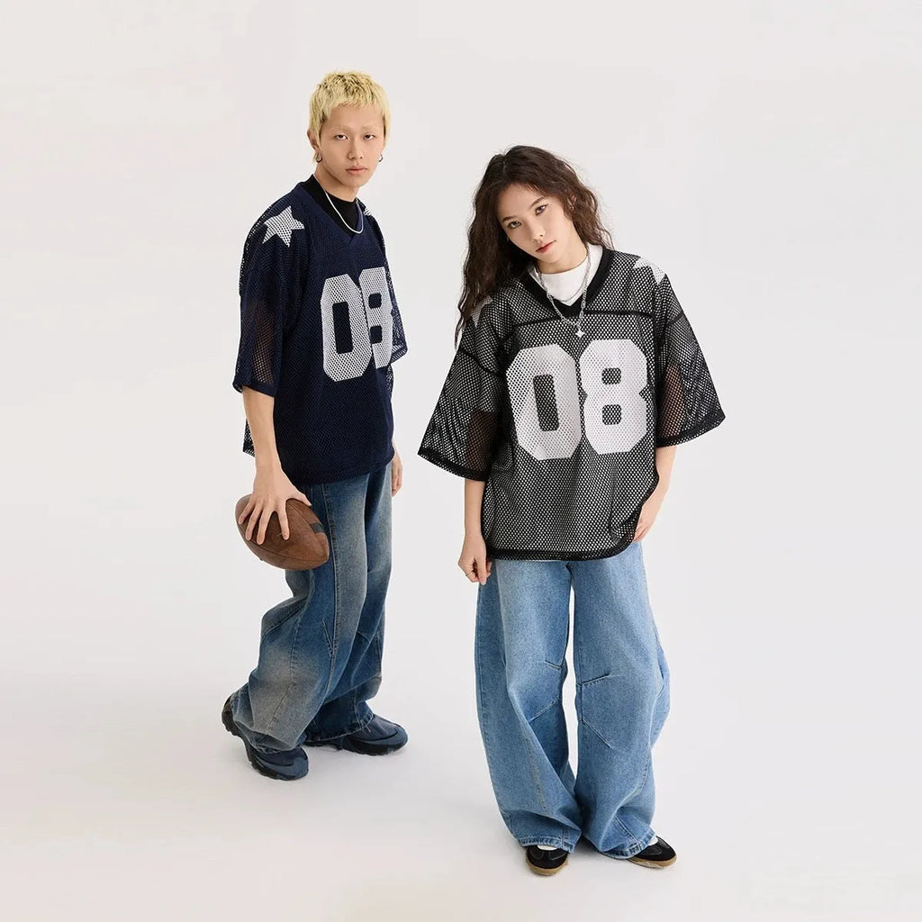 Black loose fit pullover top with white letter pattern and short sleeves