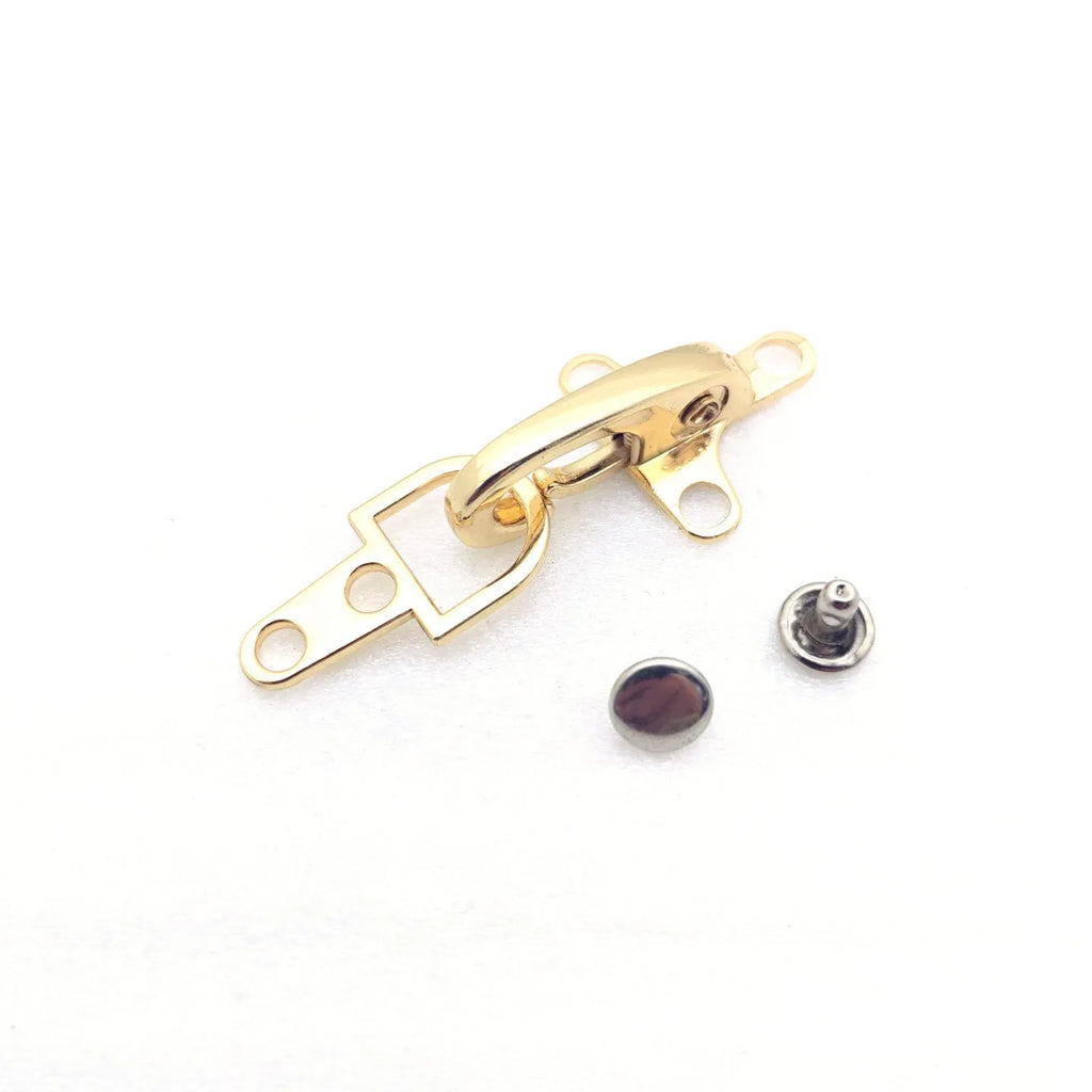 Zinc alloy aircraft-shaped hanging buckle decoration in bronze, gold, gun colour, or silver finish measuring 5.85 cm.