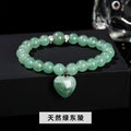 Handmade women's bracelet with geometric pendant and round natural crystal beads.
