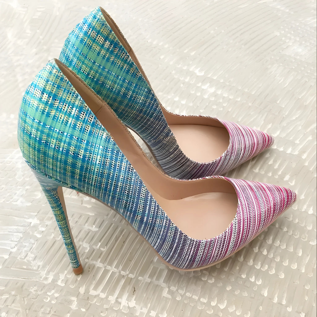 Ladies' pink-to-blue gradient patent leather high-heel shoe with a pointed toe on a rubber sole.