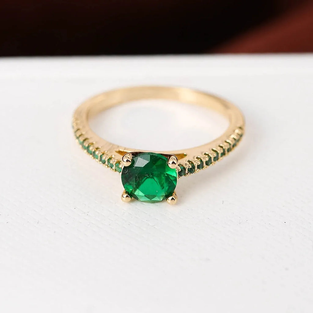 Colourful hexagonal zircon ring in copper with electroplated finish on a size 7 finger.
